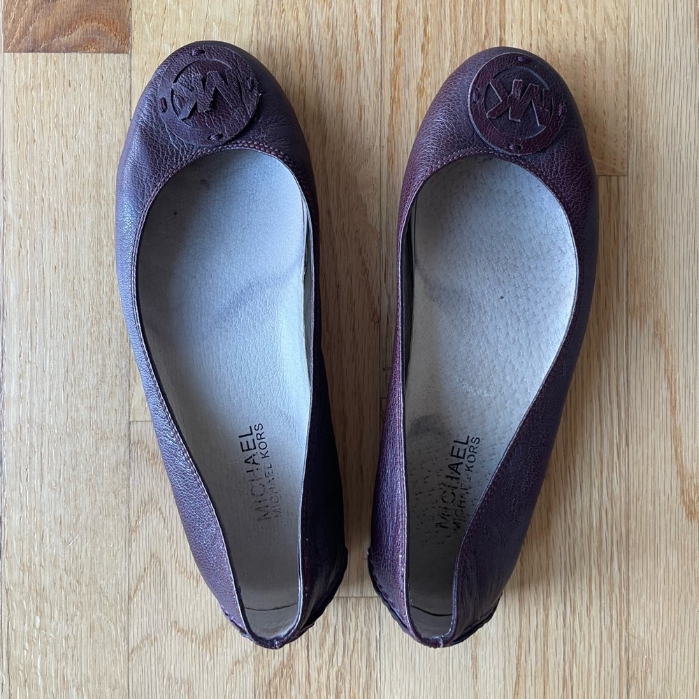 Michael Kors ballet flats.